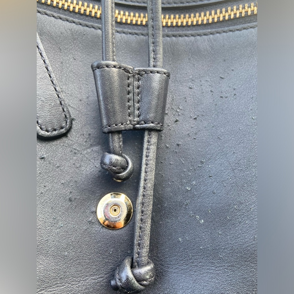 leather Coach backpack 11” x 11”.  VIEW PICS CLOSELY, SCRATCHES ON FRONT FLAP - Picture 6 of 9